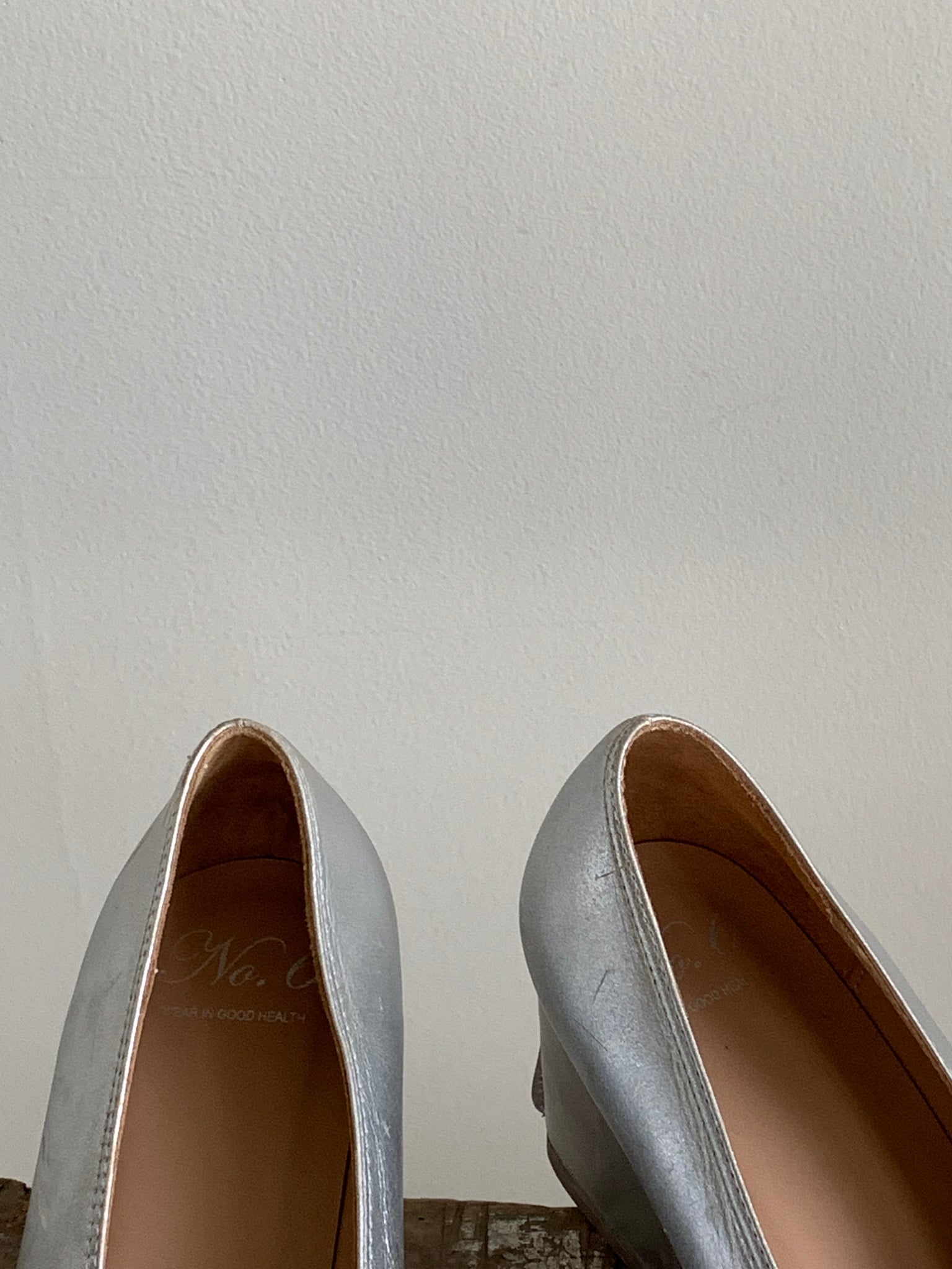 No. 6 silver pumps