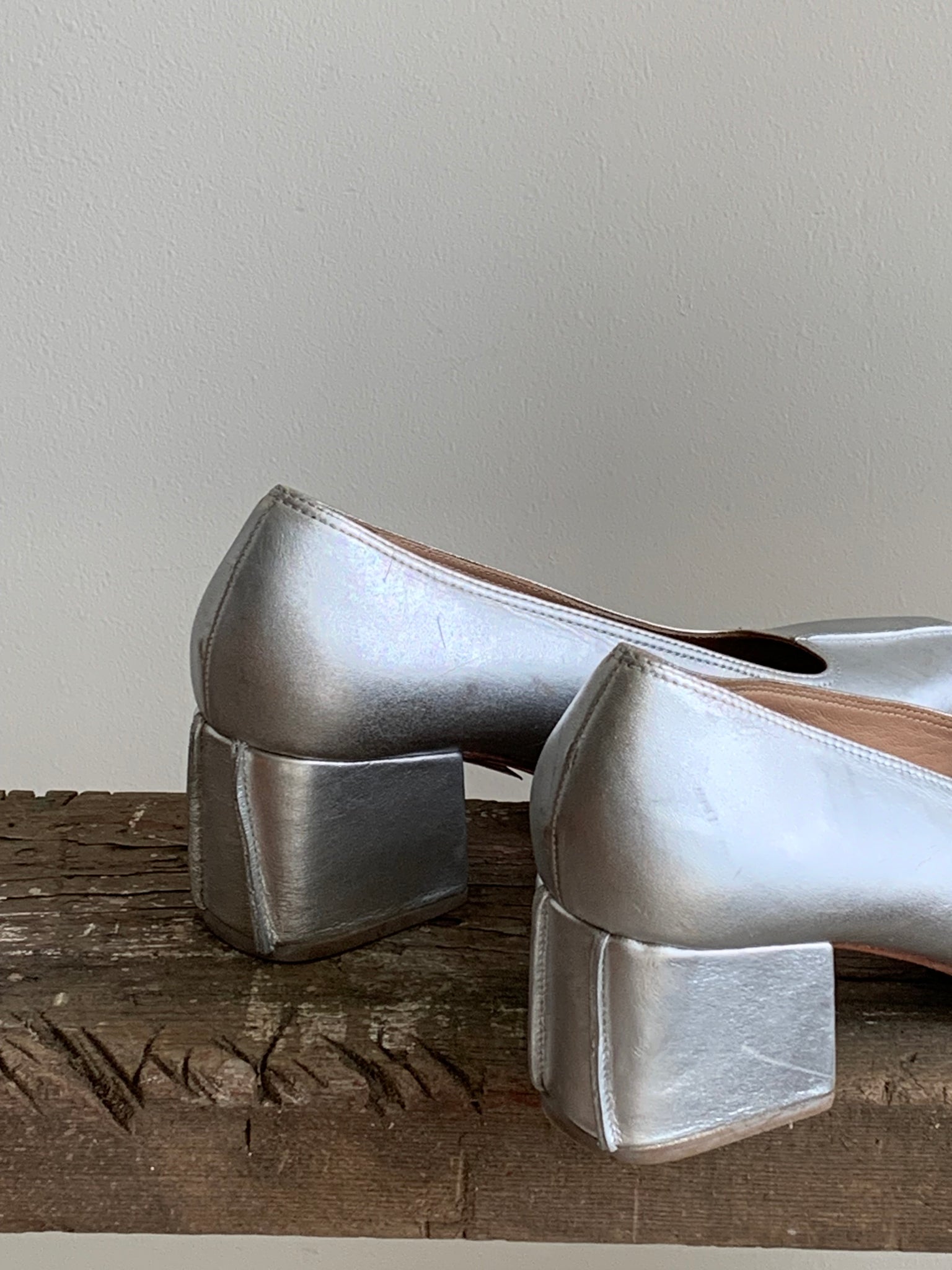 No. 6 silver pumps