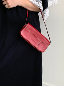 red baguette shoulder bag