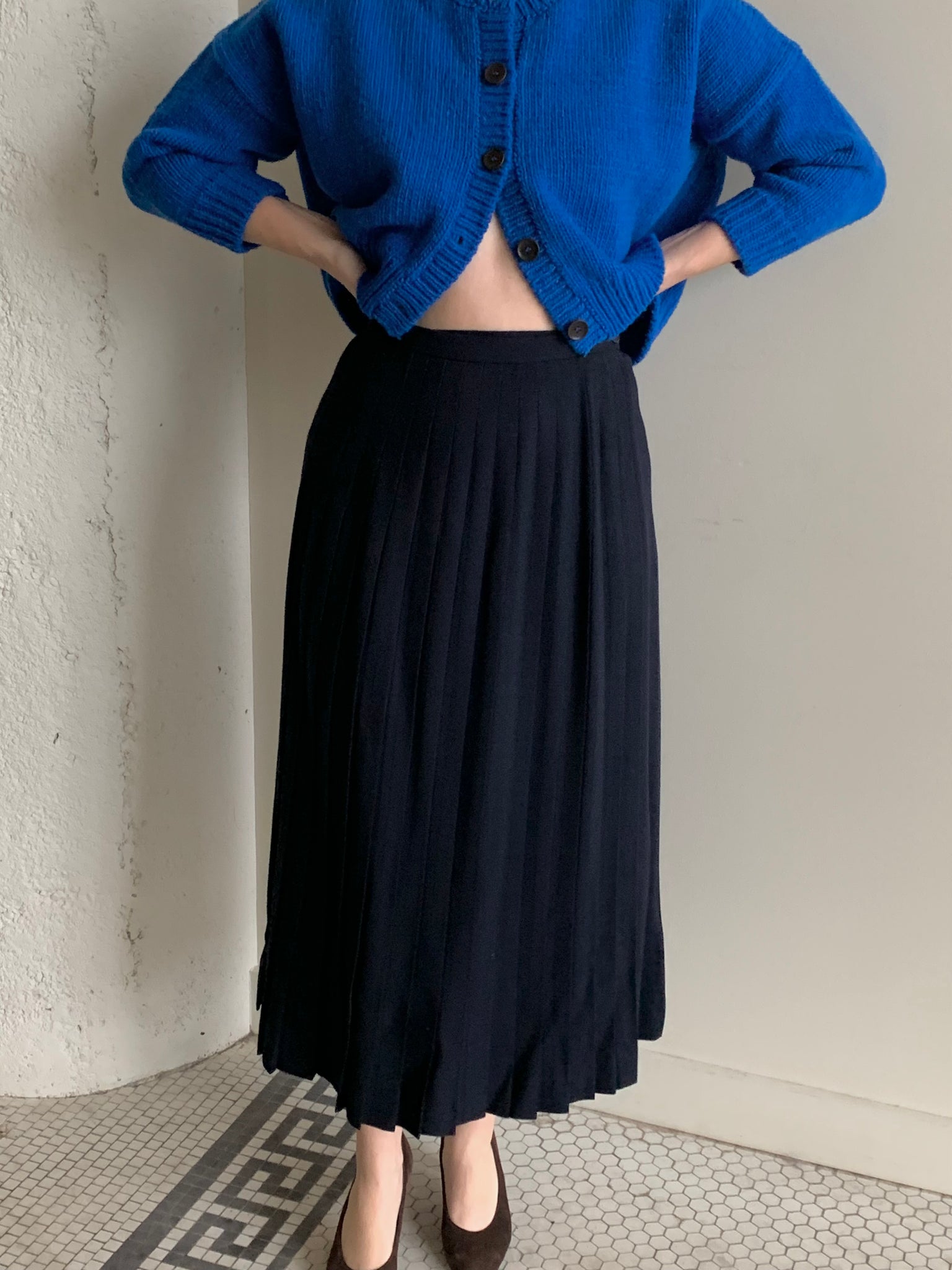 Navy pleated wool midi skirt