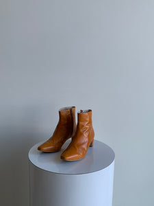 Intentionally Blank orange boots