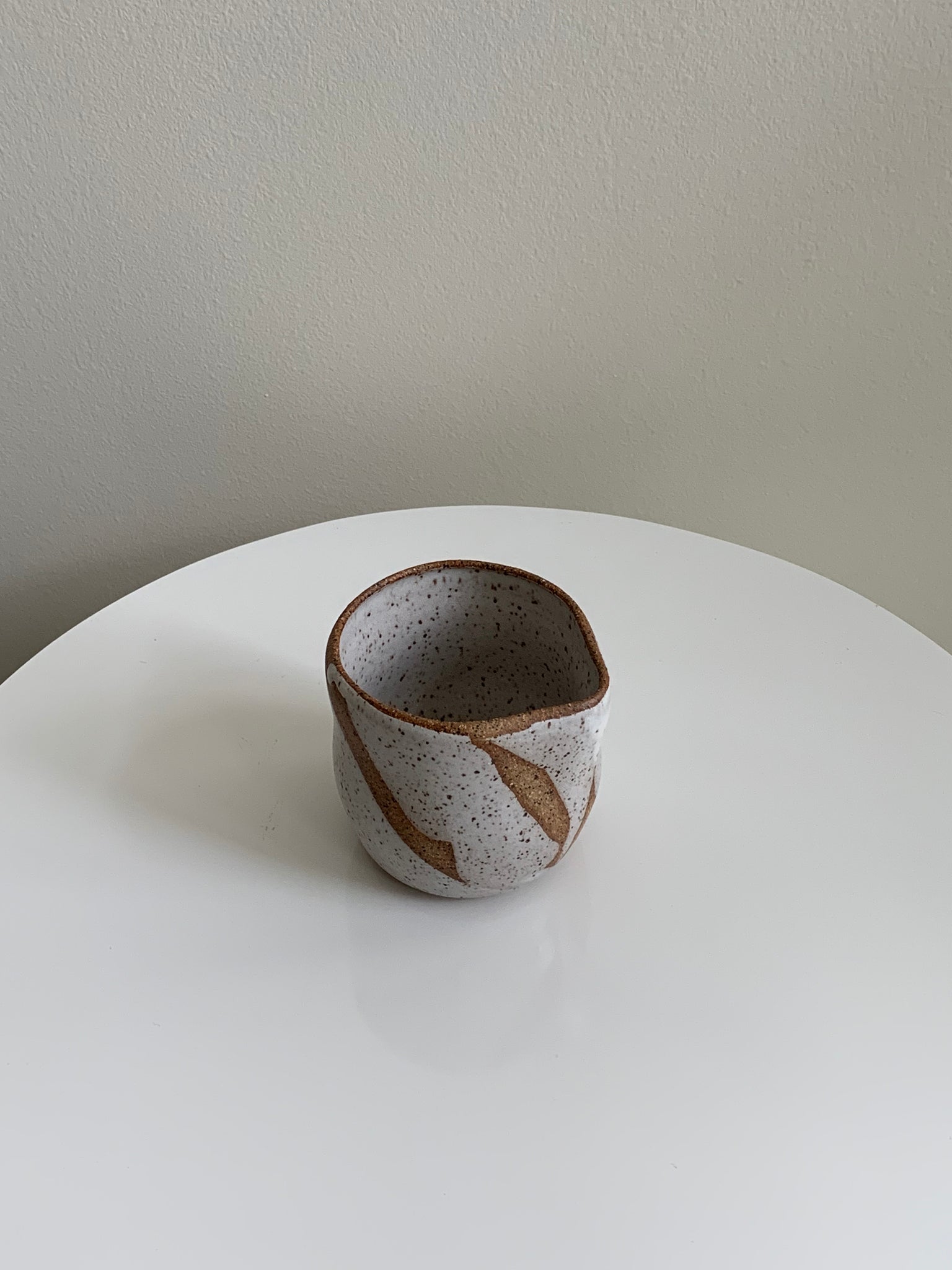 speckled ceramic saucer