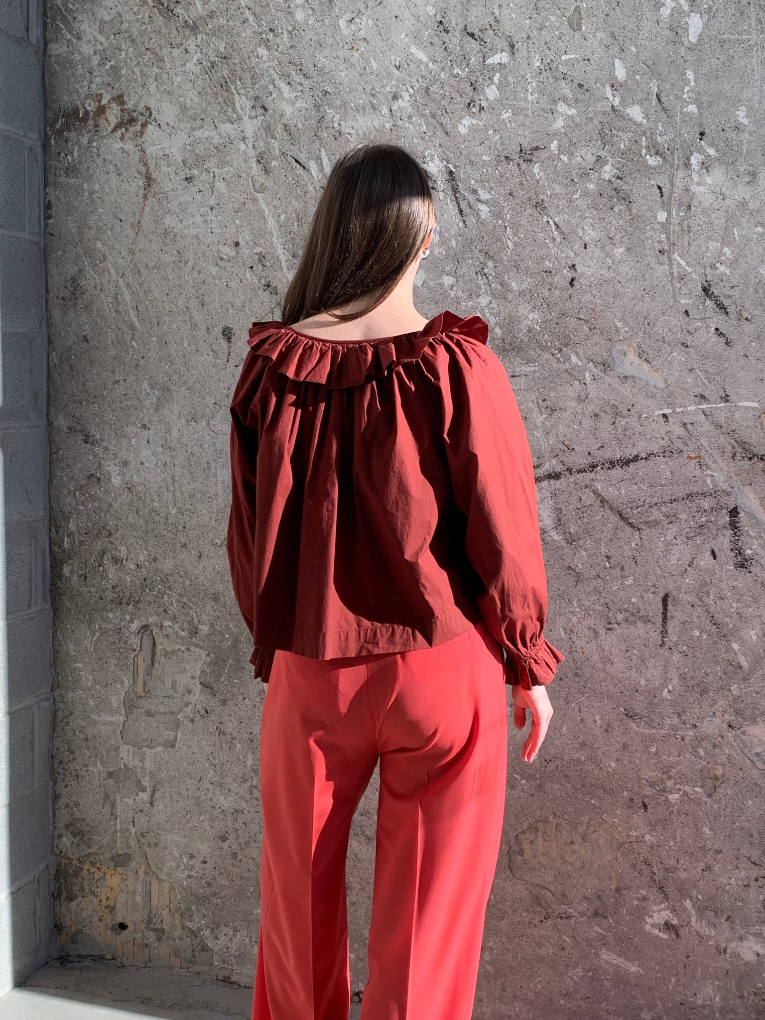 DÔEN red ruffle blouse