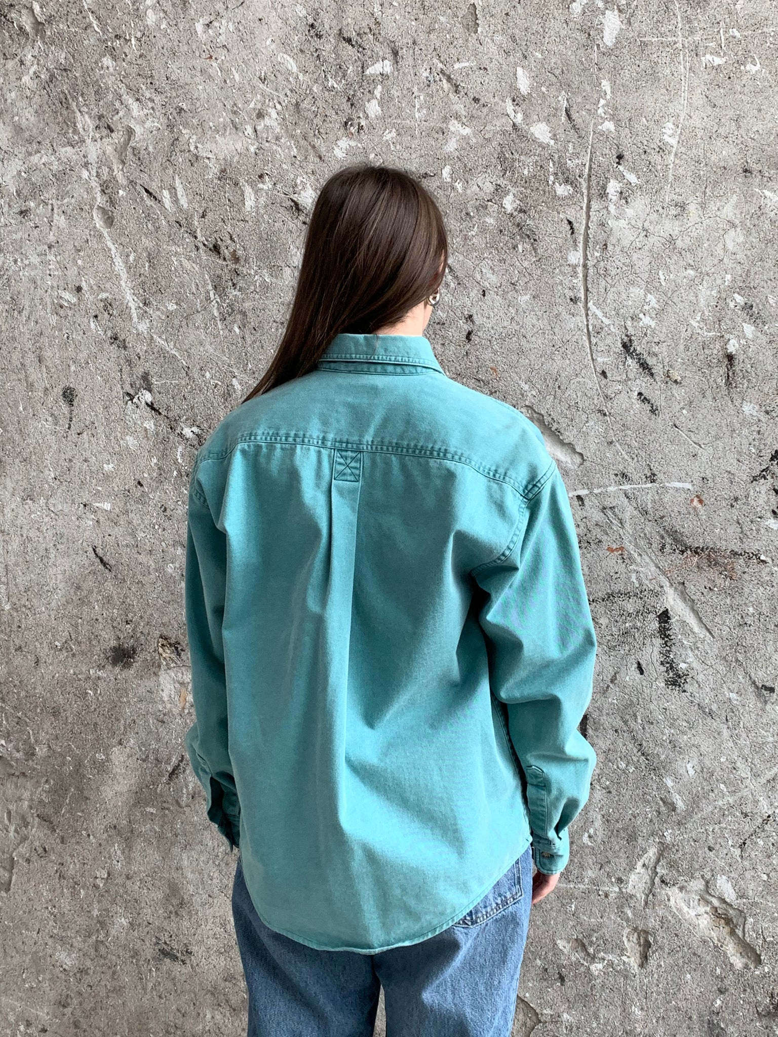 teal button down shirt