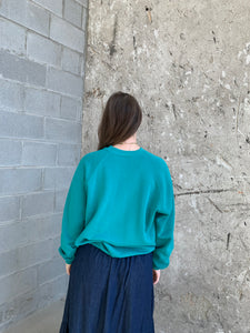 teal crew neck sweatshirt