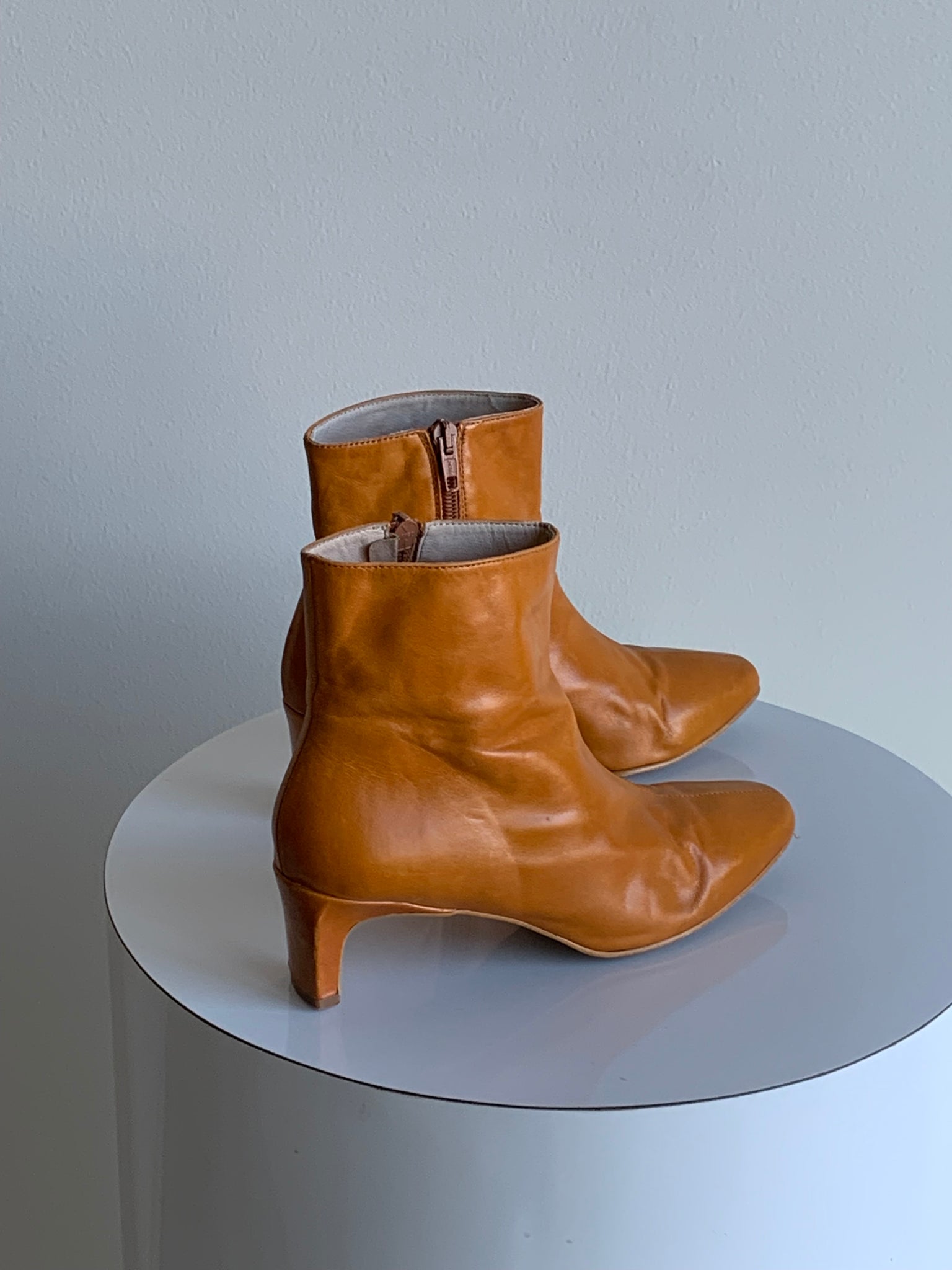 Intentionally Blank orange boots