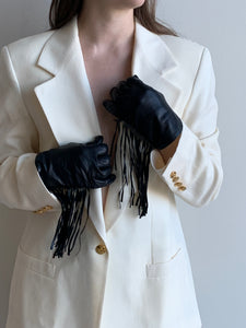 black leather gloves with fringe