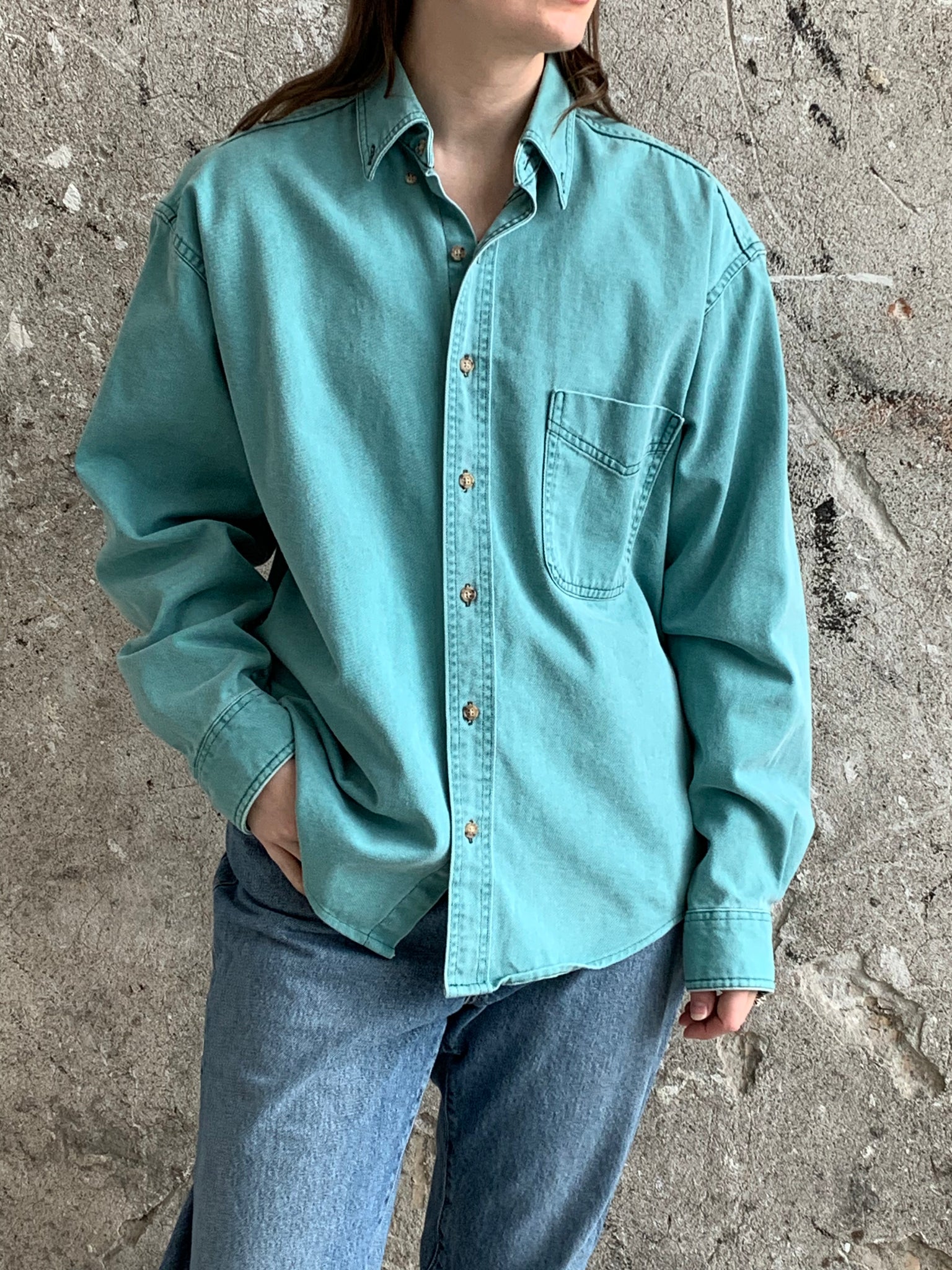 teal button down shirt