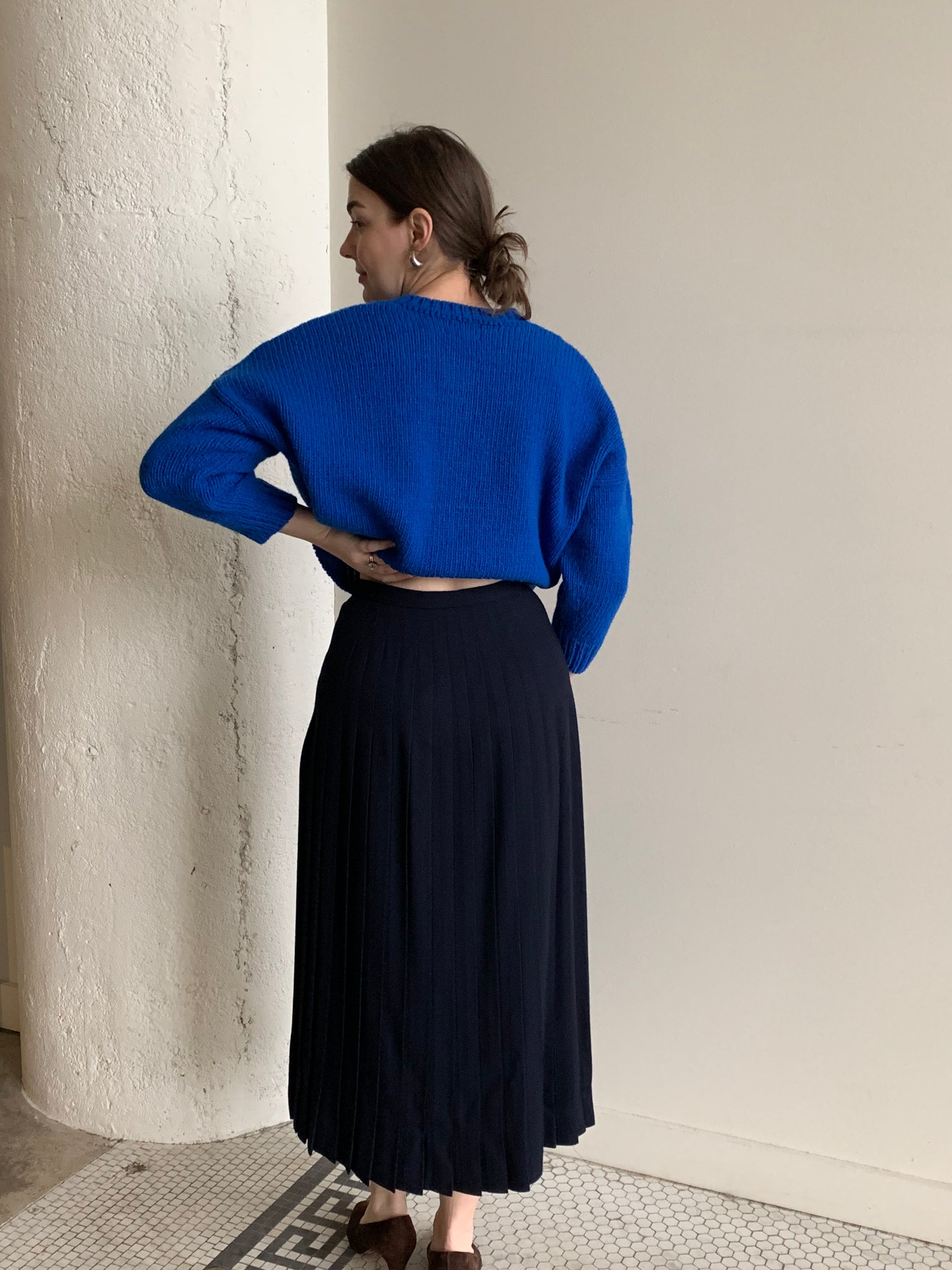 Navy pleated wool midi skirt