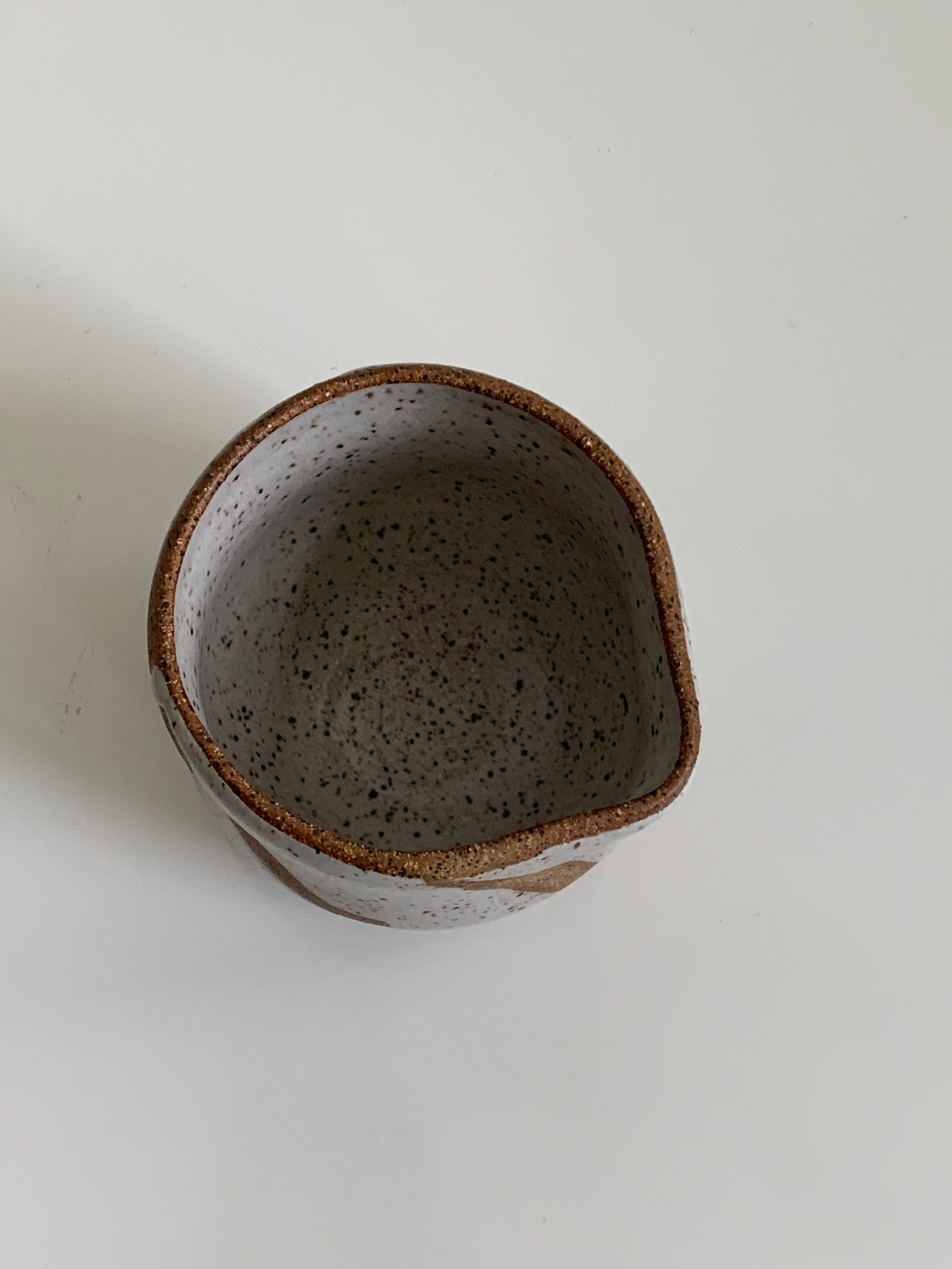 speckled ceramic saucer