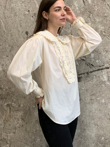 ruffled bib blouse