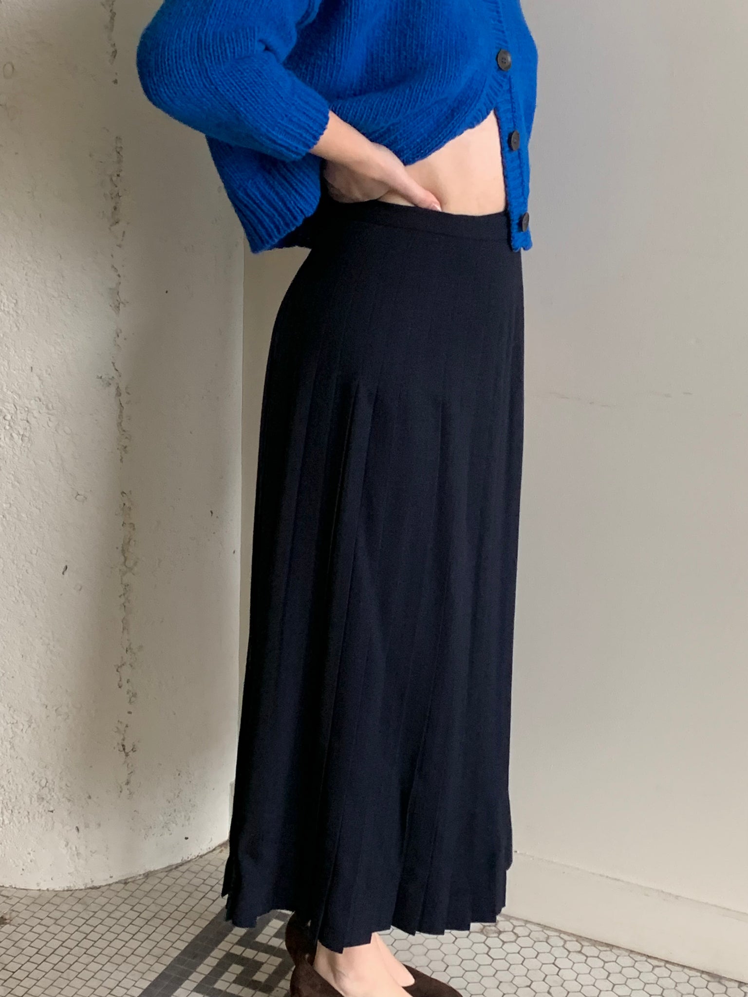 Navy pleated wool midi skirt