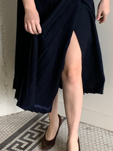 Navy pleated wool midi skirt