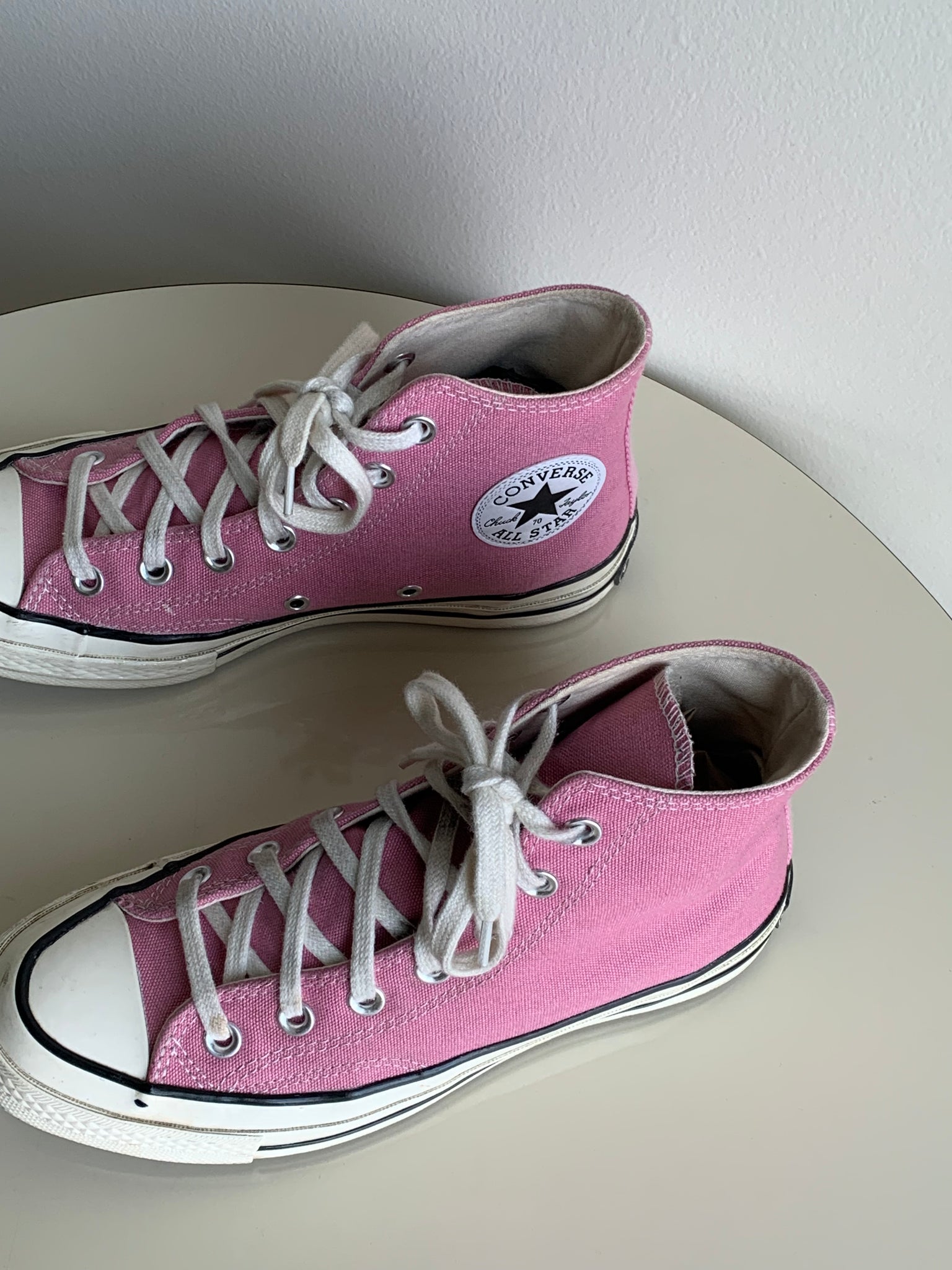 pink Converse high tops