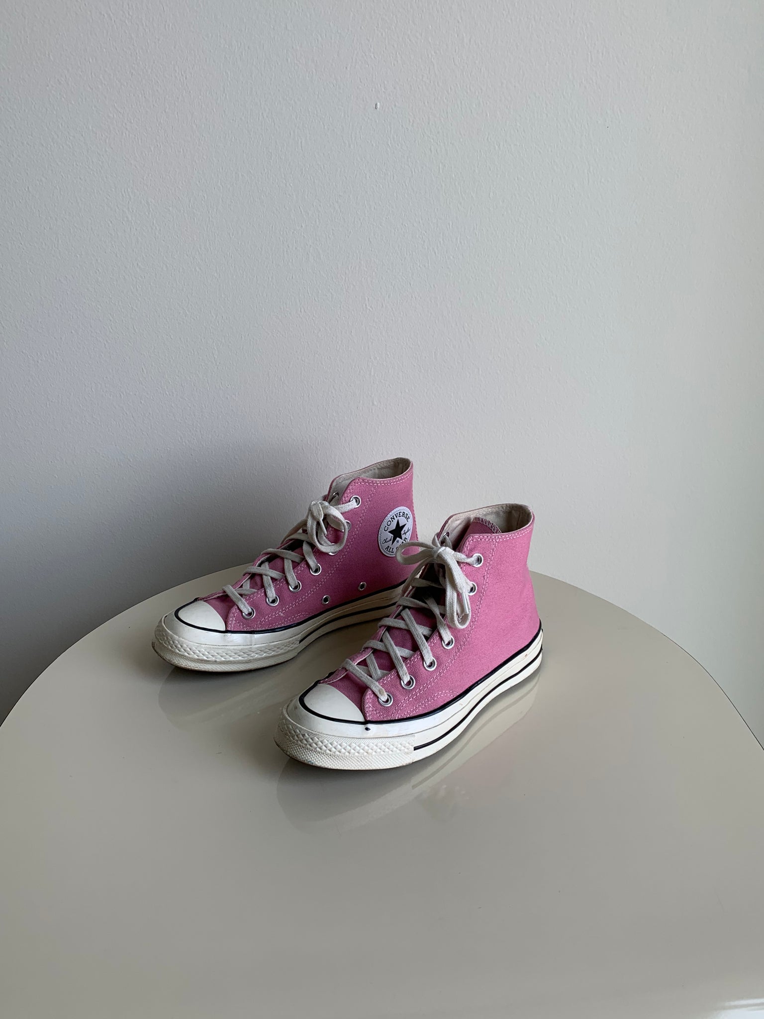 pink Converse high tops